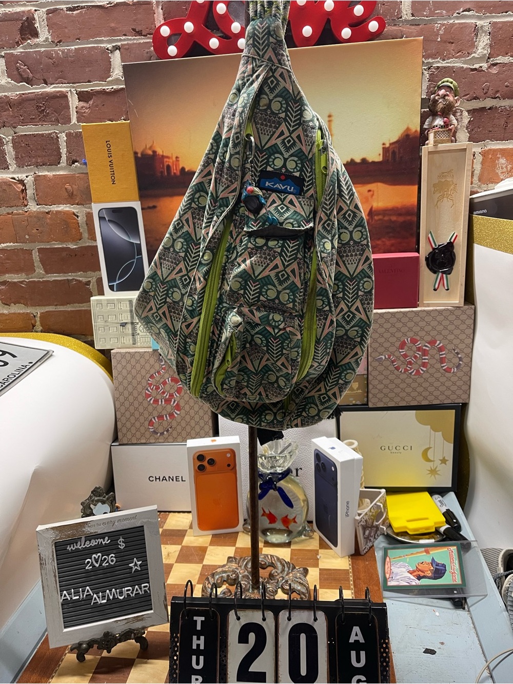 print KAVU Rope Bag featuring lime-green zippers and an owl motif accent.